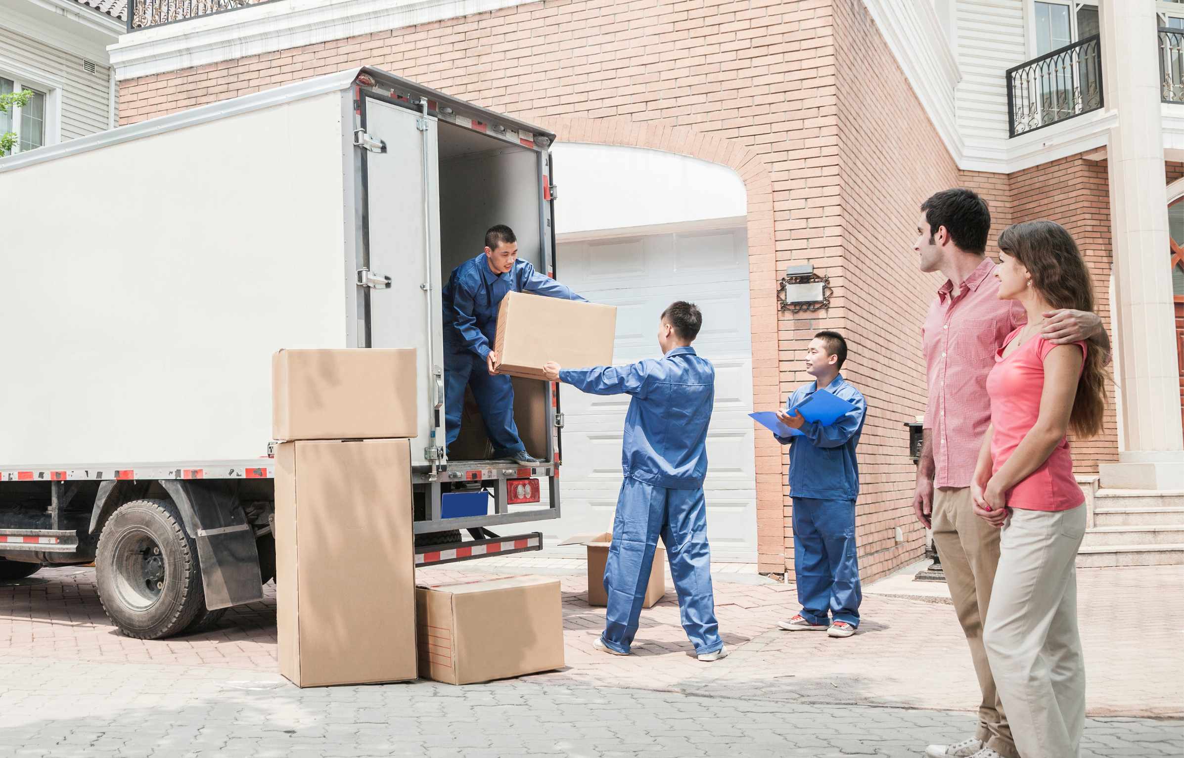 Young Couple and Movers