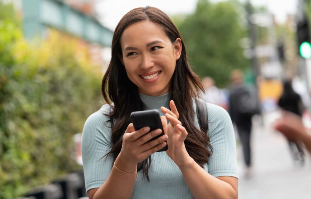 Girl looking Finance app on phone