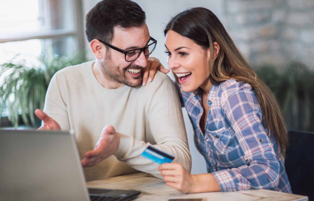 Couple Using Laptop