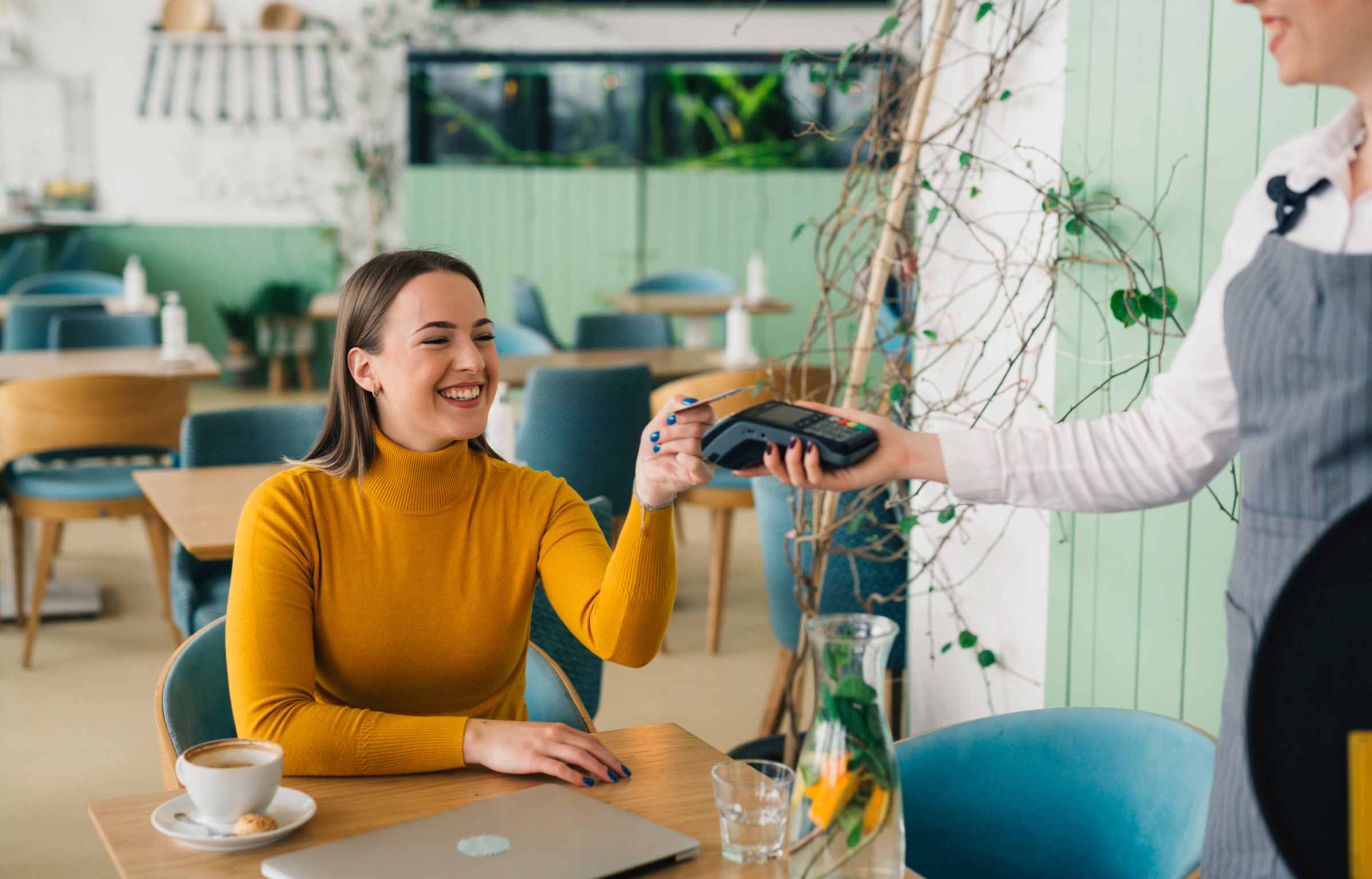 Cute Women Paying Bill From Credit Card (2)