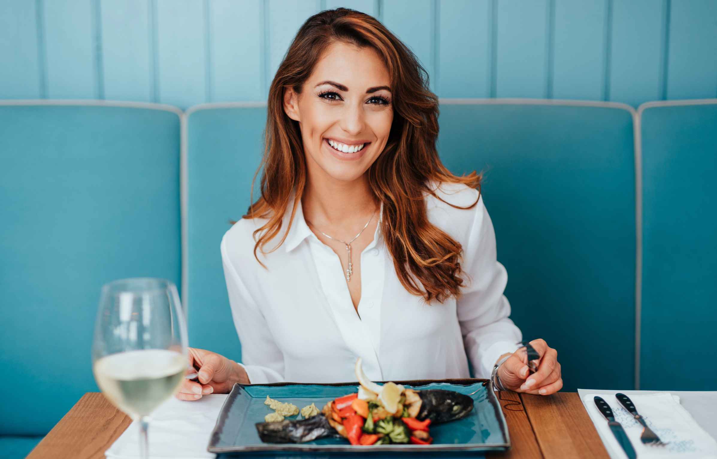 Smiling Women in Priority Pass Dining Lounge