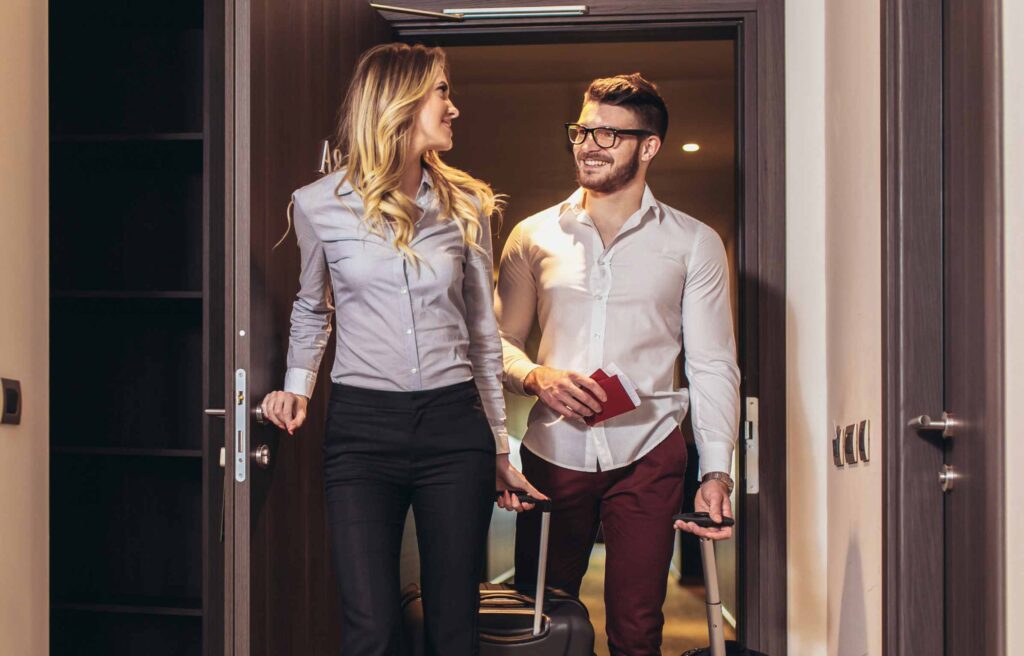 Couple entering the hotel room