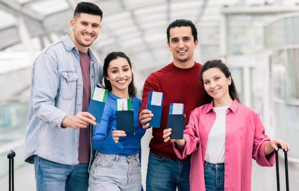 Travel Group Showing Passport with Luggage