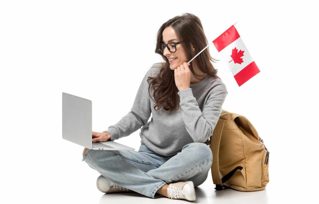 Backpack Women using Laptop and holding Canada flag Checking Canada Express Entry Guide