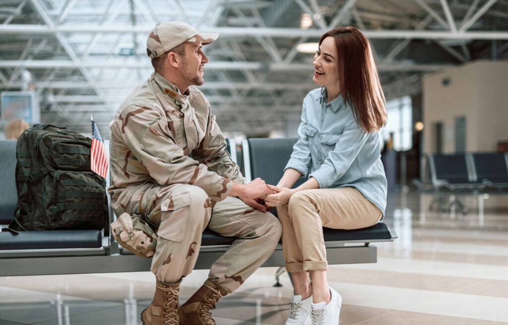 Soldier man with her wife at airport