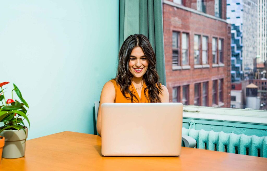 Woman Using Laptop