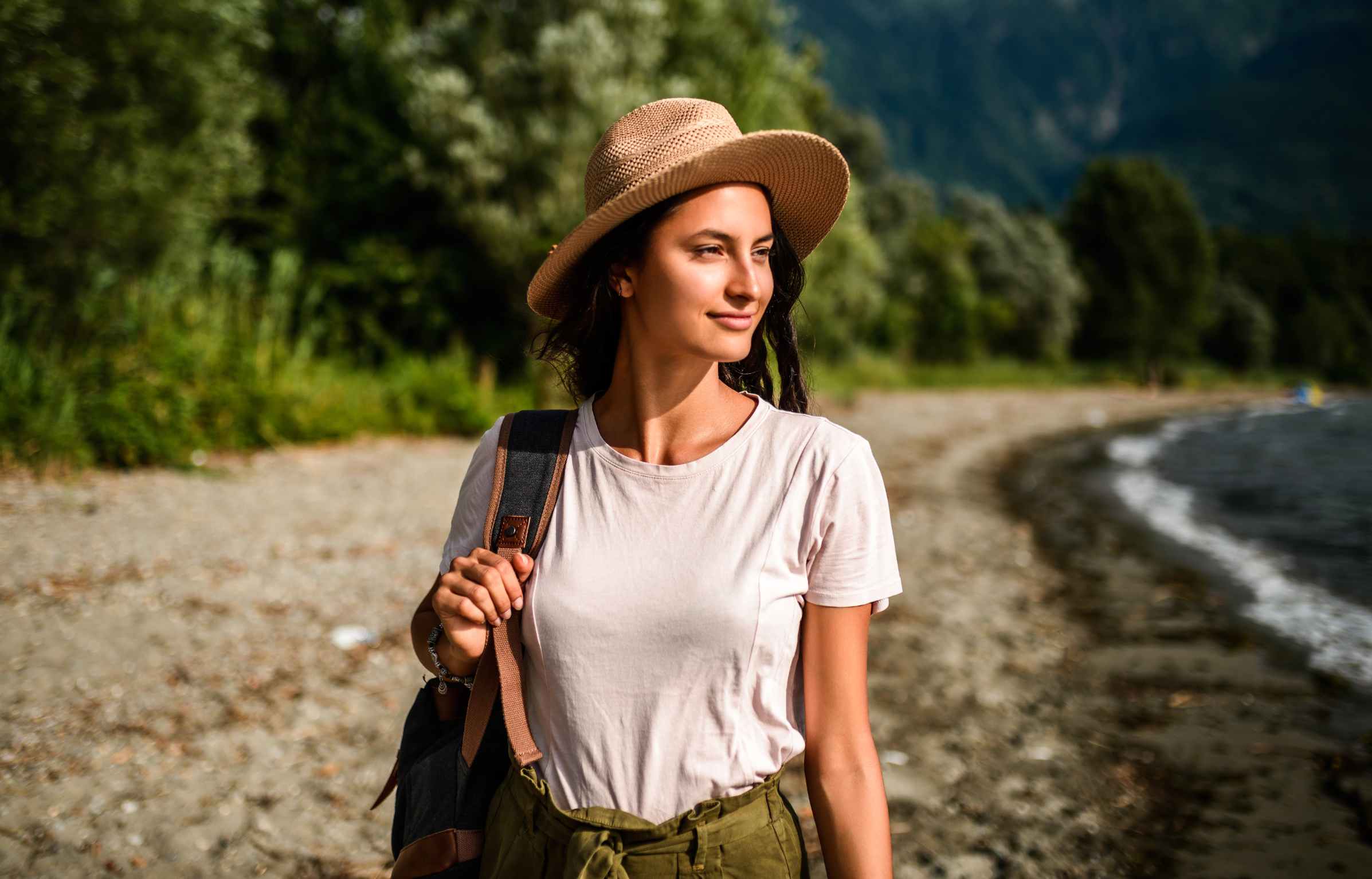 Solo Backpack Women Wearing Hat