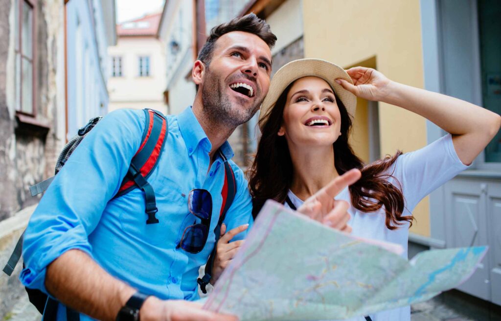 Young happy couple on a sightseeing tour in Europe