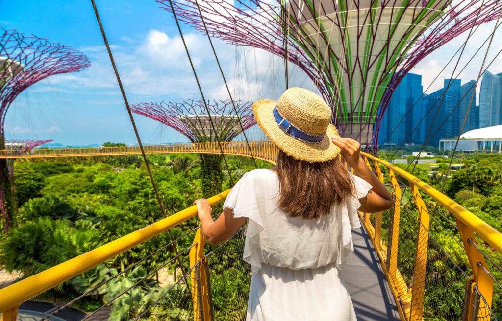 A woman at Gardens by the Bay in Singapore, after moving to singapore from the uk