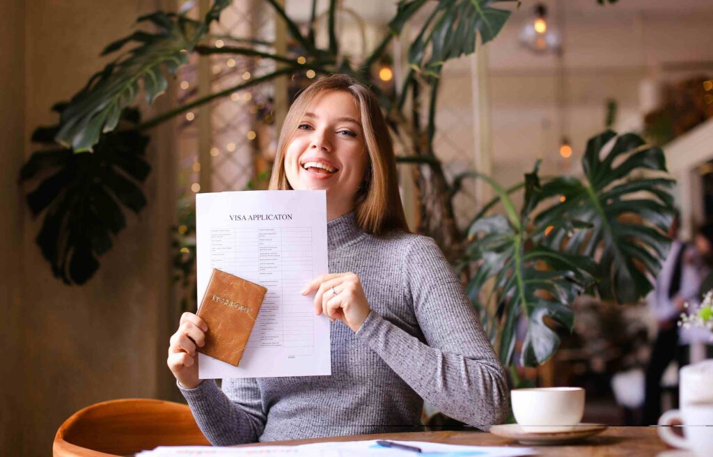 Cute caucasian woman showing b211a visa bali application