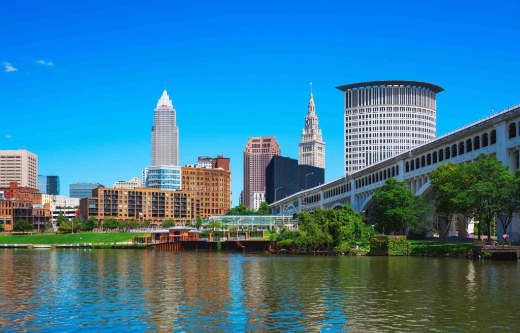 Cleveland, Ohio, skyline with modern and historic buildings along the waterfront, is a growing hub among the top 10 cities for real estate investment.