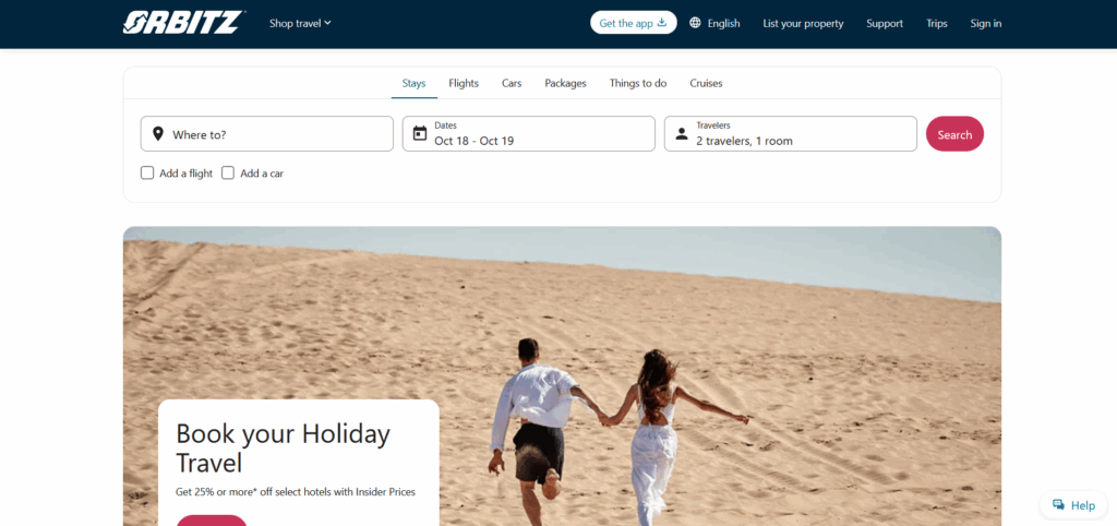 Homepage of Orbitz showing a couple running on sand dunes and a search bar for flights, hotels, and holiday packages, highlighting the Orbitz review focus on easy travel booking.