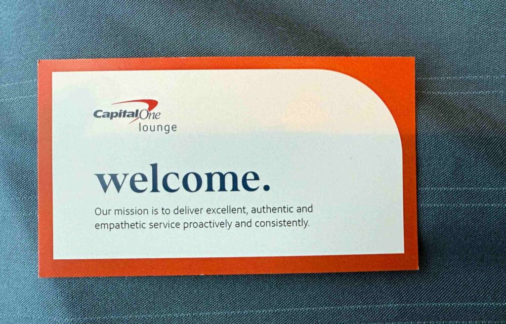 Wi-Fi card showing the lounge network name and password.