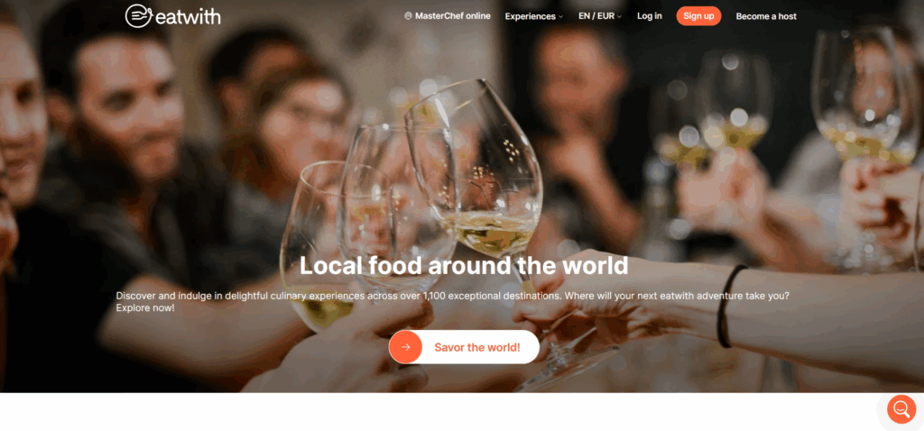 EatWith destination page with guests raising wine glasses to highlight global food experiences.