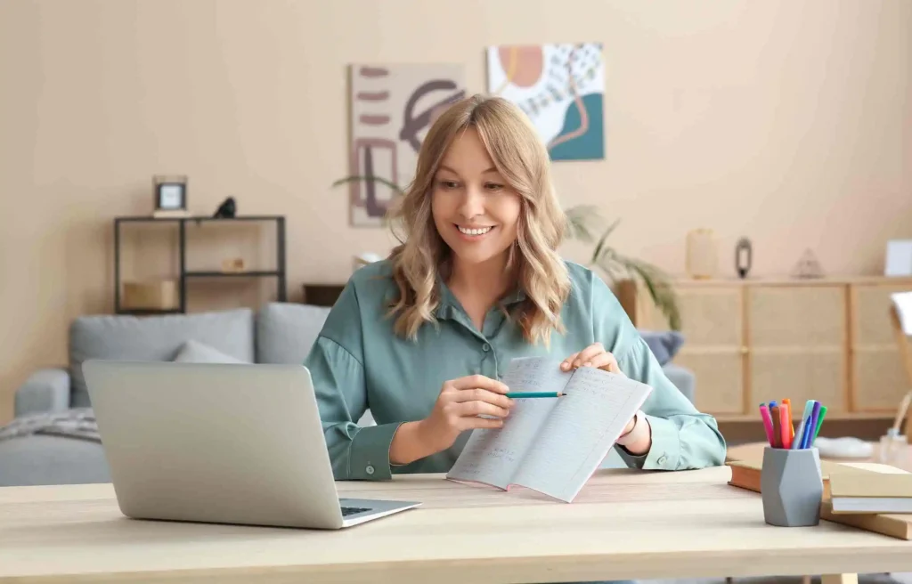 Online tutor teaching remotely from home, one of the digital nomad jobs for beginners with consistent income.