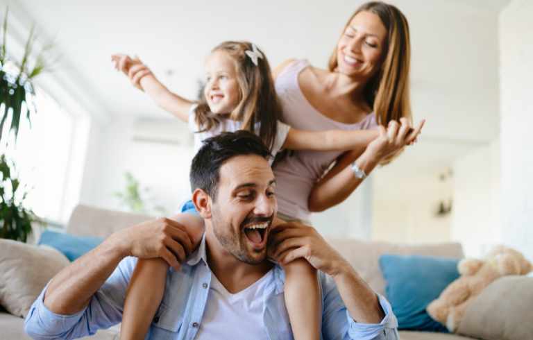 happy family avoids employee relocations fail and enjoying their time at home