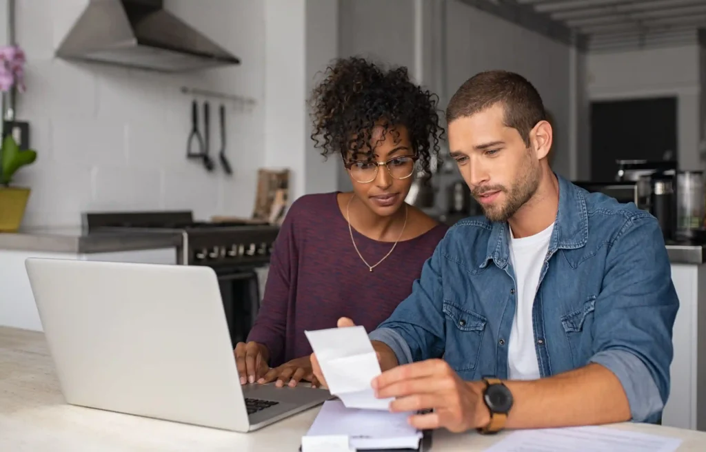 couple discussing on how to get approved for a home depot credit card