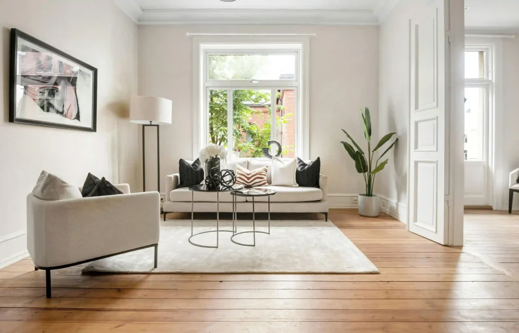 Bright furnished apartment living room to help students find safe student housing before moving abroad.