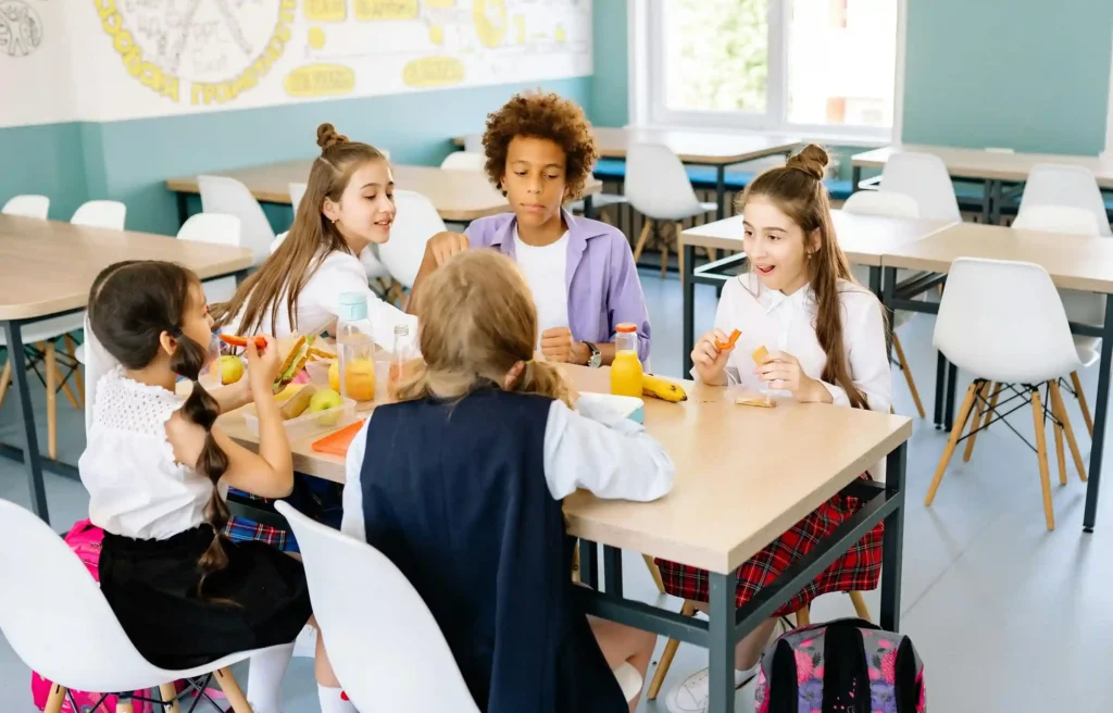 Students are eating lunch at school, and school enrollment deadlines are approaching.
