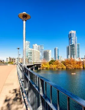 Scenic waterfront walkway overlooking Lady Bird Lake in Austin